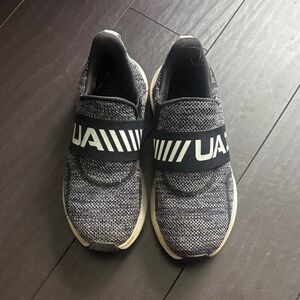 Under Armour Black and White Slip-On Athletic Shoes